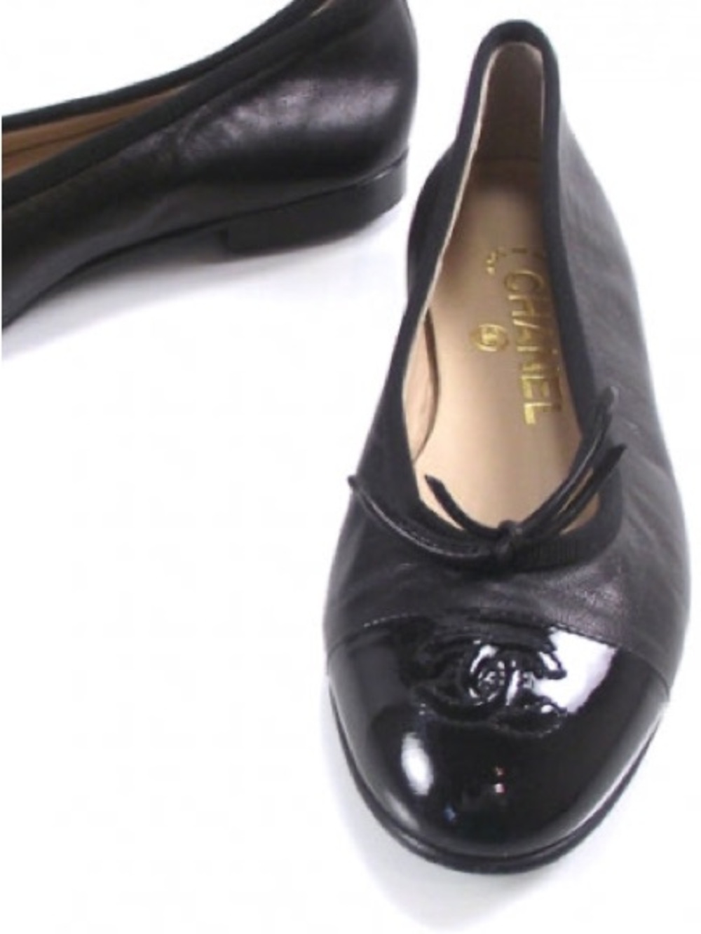 CHANEL Black Leather Cap-Toe Ballet Flats with Bow